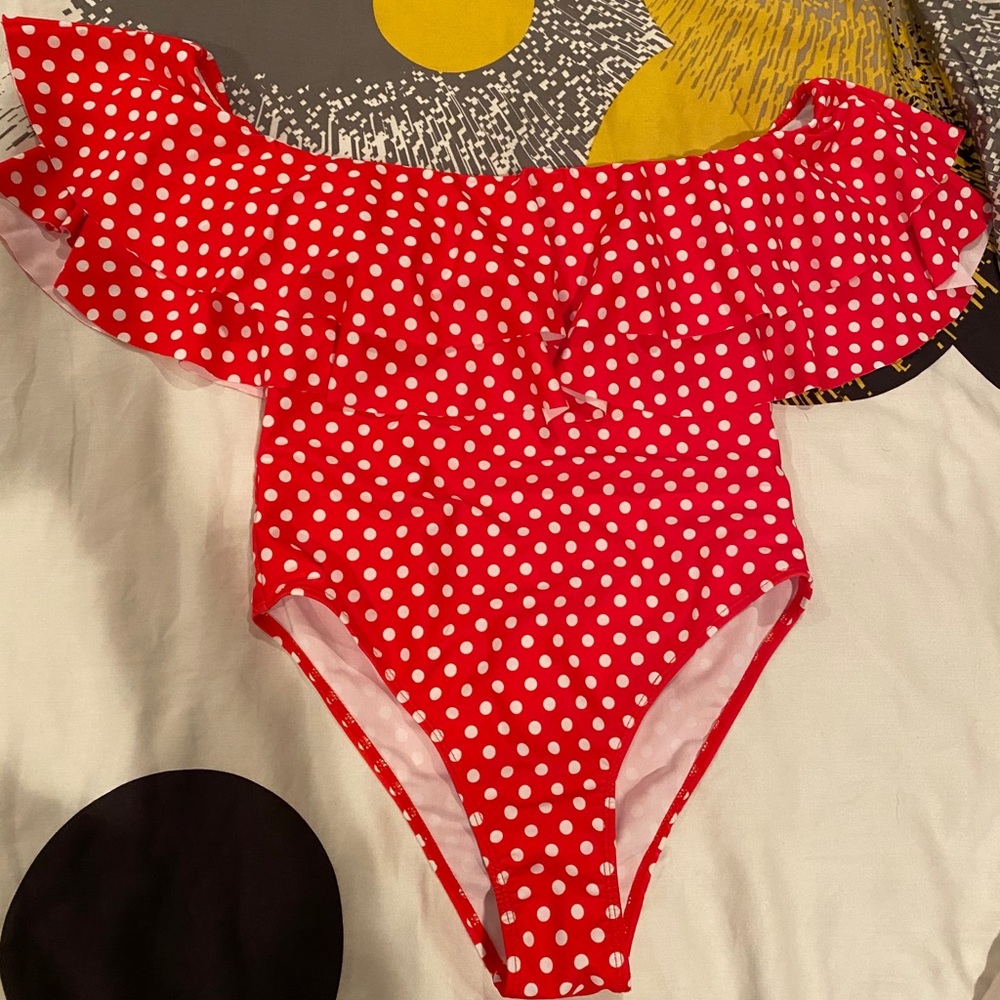 Red and white polka dot one piece swimsuit